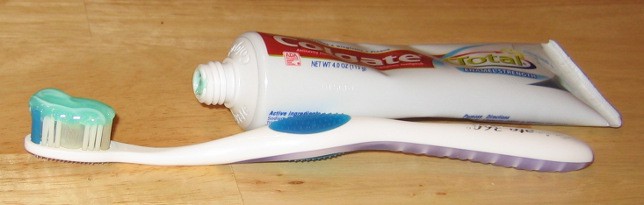 A Large Stripe of Colgate on a Brush