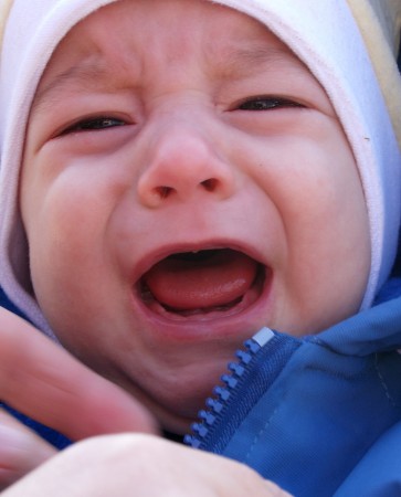 What are some signs a baby is teething?