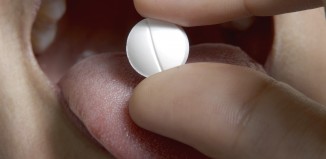 Putting Aspirin on Toothache