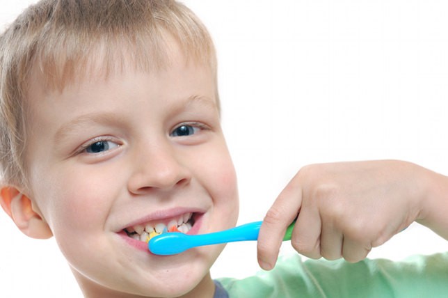 when can babies brush their teeth